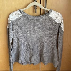 Laced cold shoulder knit sweater